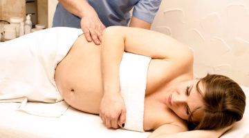 Woman Receiving Prenatal Massage